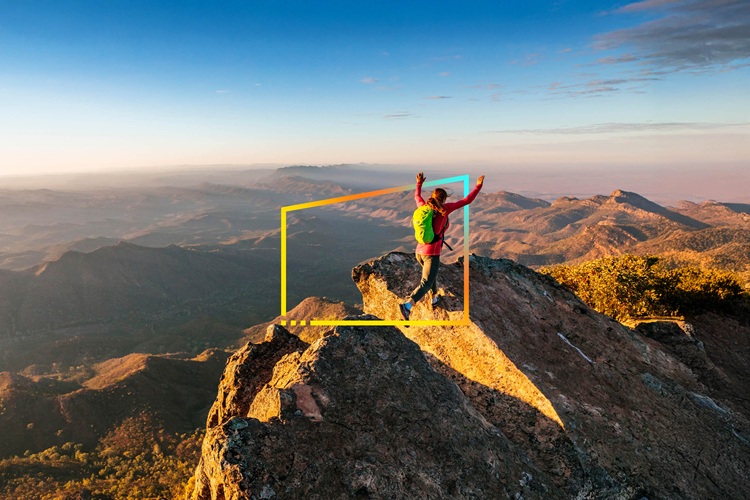 ey-a-woman-leaps-across-a-gap-in-the-rocky-ridge-in-south-australia-static-no-zoom
