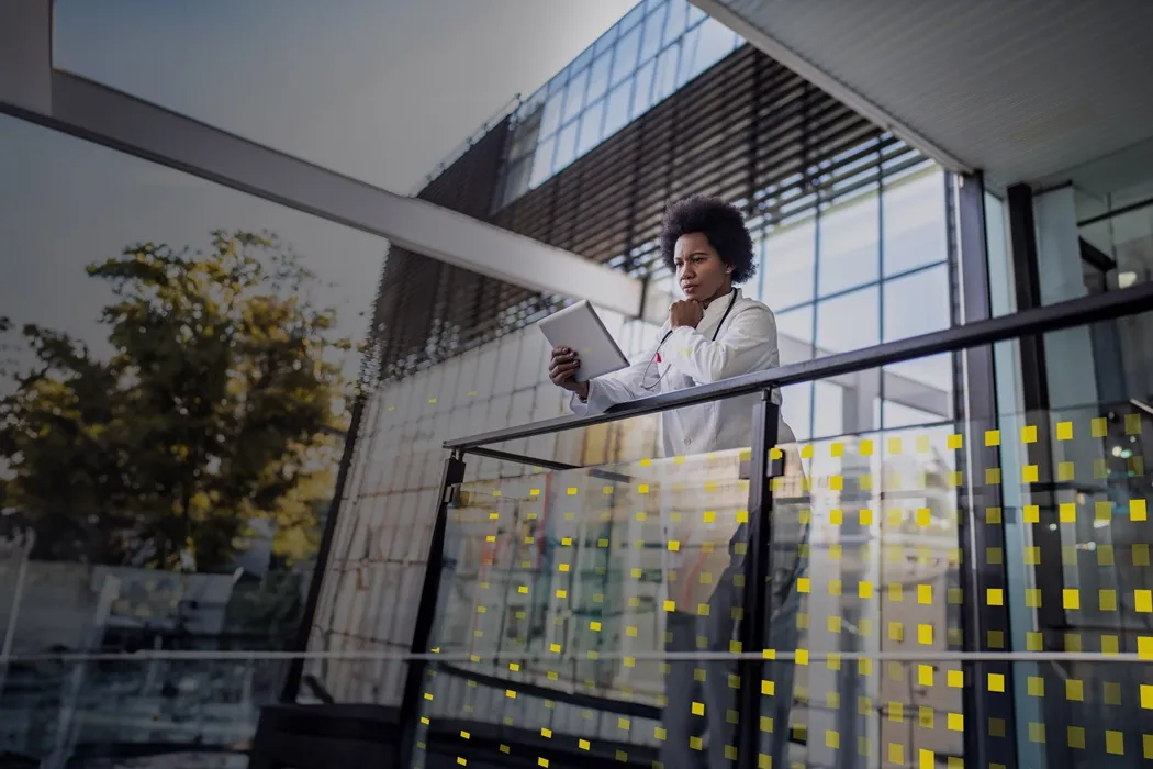 ey-ai-female-doctor-working-on-digital-tablet